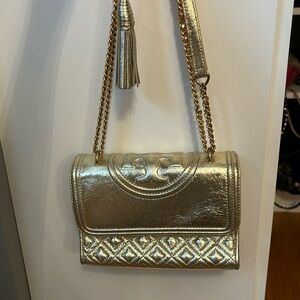 Gold Tory Burch quilted purse